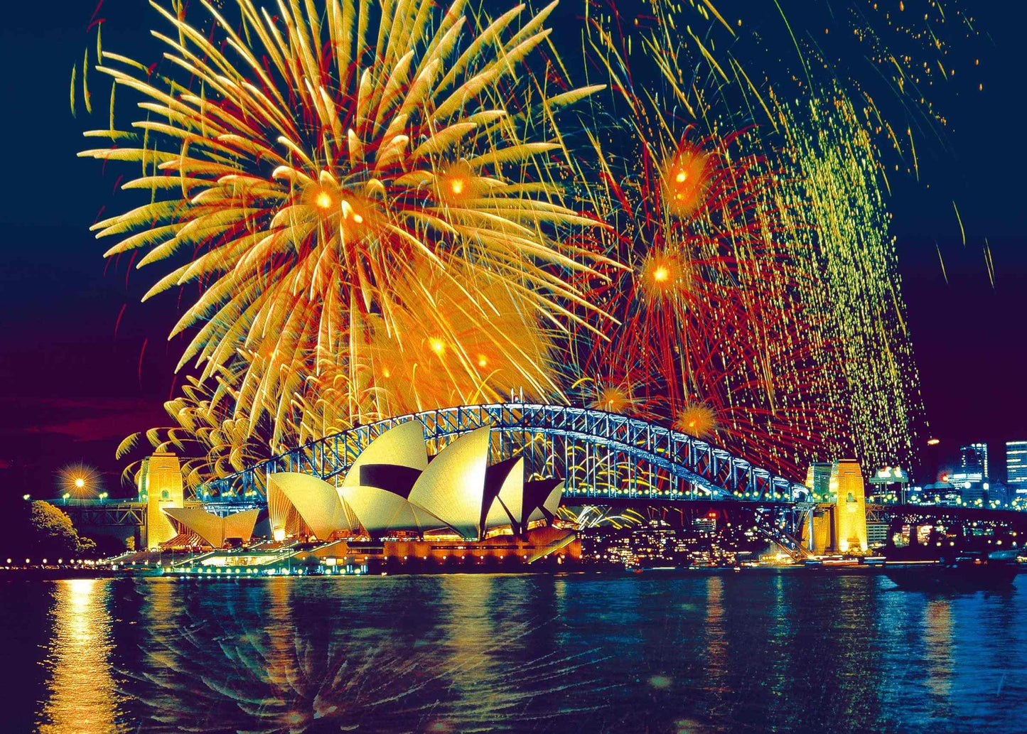 The image for the 1000 piece Ravensburger puzzle shows brilliant gold fireworks illuminating the Sydney Opera House and Harbour Bridge