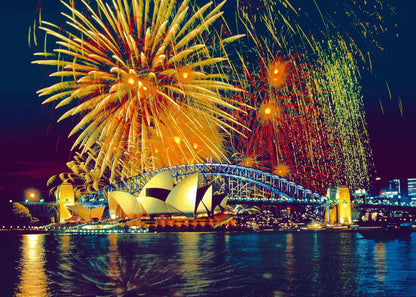 The image for the 1000 piece Ravensburger puzzle shows brilliant gold fireworks illuminating the Sydney Opera House and Harbour Bridge