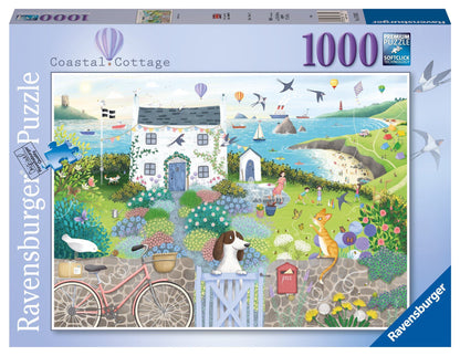 Box for the Ravensburger 1000 piece Coastal Cottage puzzle featuring an illustration of a whimsical seaside home surrounded by flowers and a friendly dog