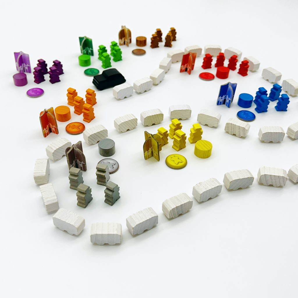 Game components including money, pieces, and tokens in game setup