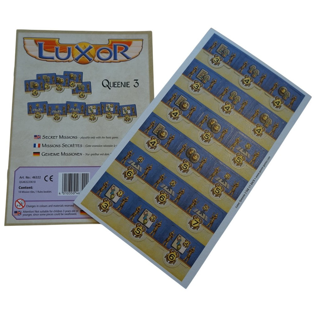 Luxor Queenie 3 board game expansion with its box and a sheet of unpunched Egyptian-themed mission tiles