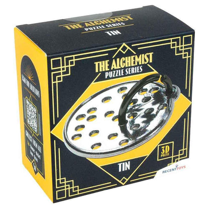 Box for The Alchemist Puzzle Series "Tin" 3D puzzle, showing a silver perforated metal disc and black loop