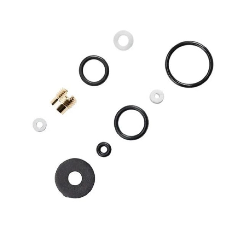 An airbrush seal kit including a brass threaded part, various black O-rings, and white and black washers