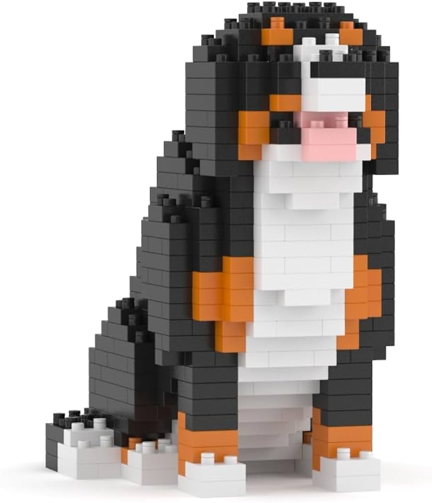 Sitting tri-color dog figure (black, white, orange) built from small plastic building bricks
