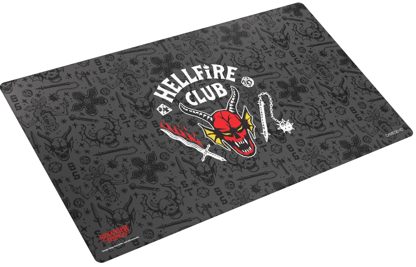 Hellfire Club gaming mat with a red demon logo, sword, and flail, patterned with Demogorgon heads, skulls, weapons, and D&D dice on a dark background