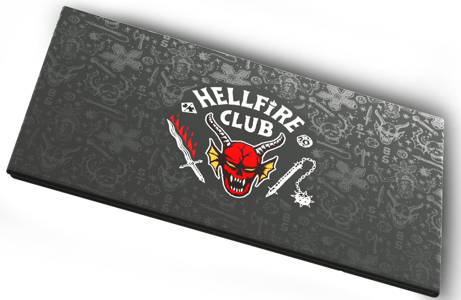 Hellfire Club logo mat with red demon, fiery sword, spiked mace, and D&D symbols like skulls, Demogorgons, and dice in the background