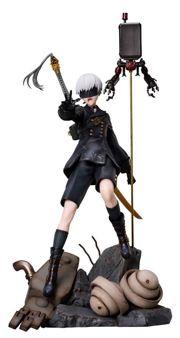 A Nier: Automata 9S figure, blindfolded and in a black uniform, holds a sword, with his Pod 153 and machine debris on the base