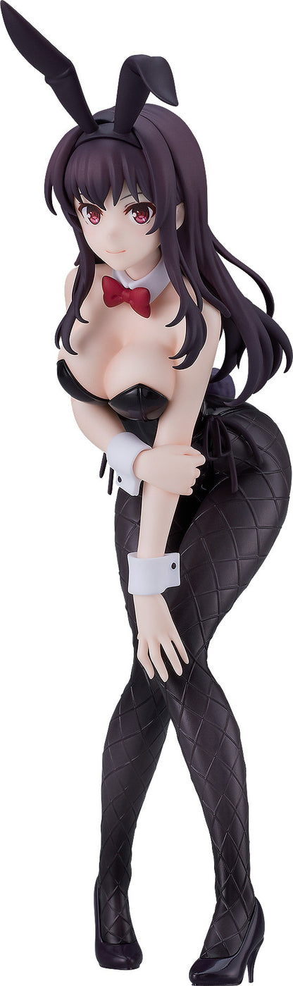 Figure in a black bunny costume with fishnet stockings and red bow tie