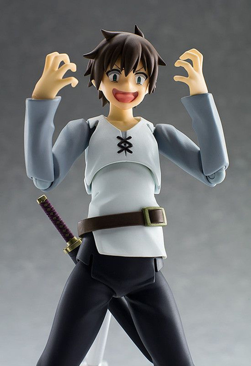 figma Kazuma action figure with exaggerated happy expression grey sleeves white tunic with black lacing dark belt with gold buckle and a sheathed sword