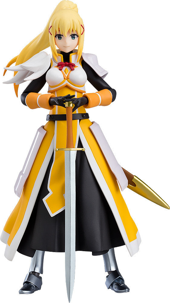 A Good Smile Company Figma Darkness figure with blonde hair and blue-green eyes stands holding a large silver sword vertically, wearing detailed yellow and white armor over a black undersuit