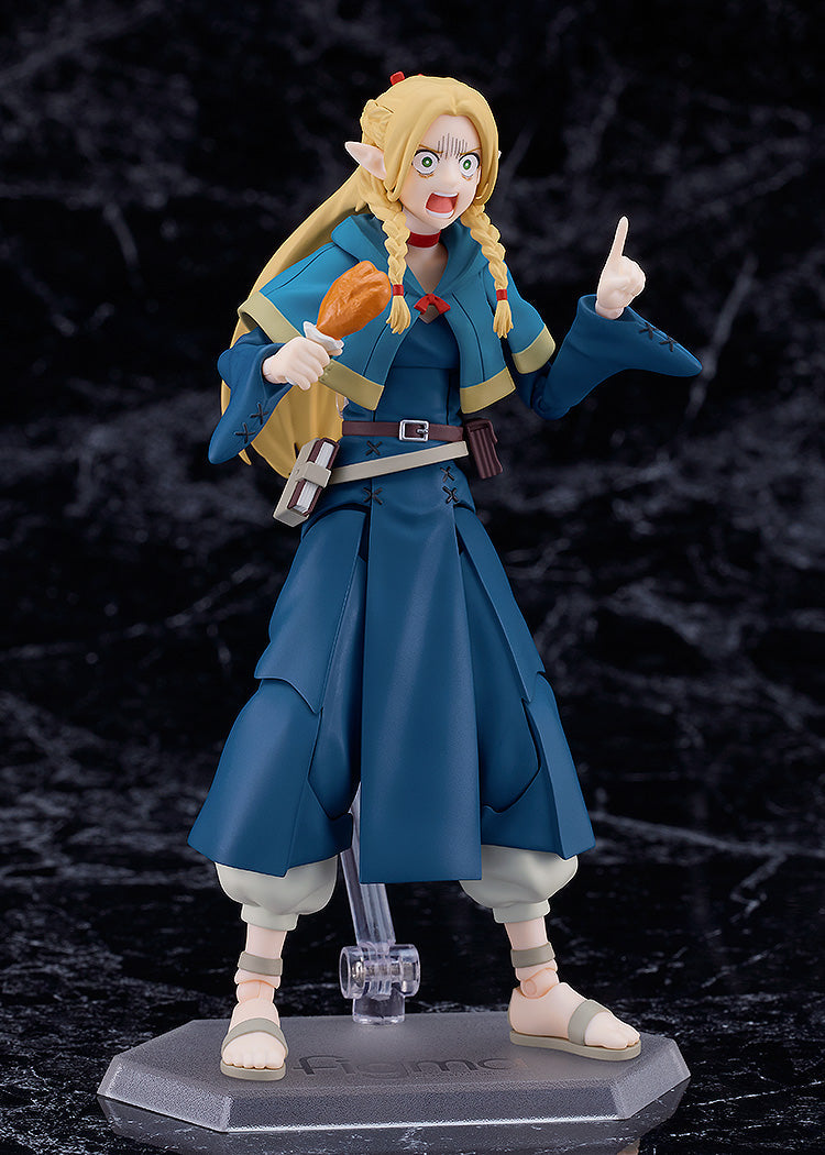 Delicious in Dungeon figma Marcille figure in blue outfit holding chicken drumstick with shocked expression standing on figma base