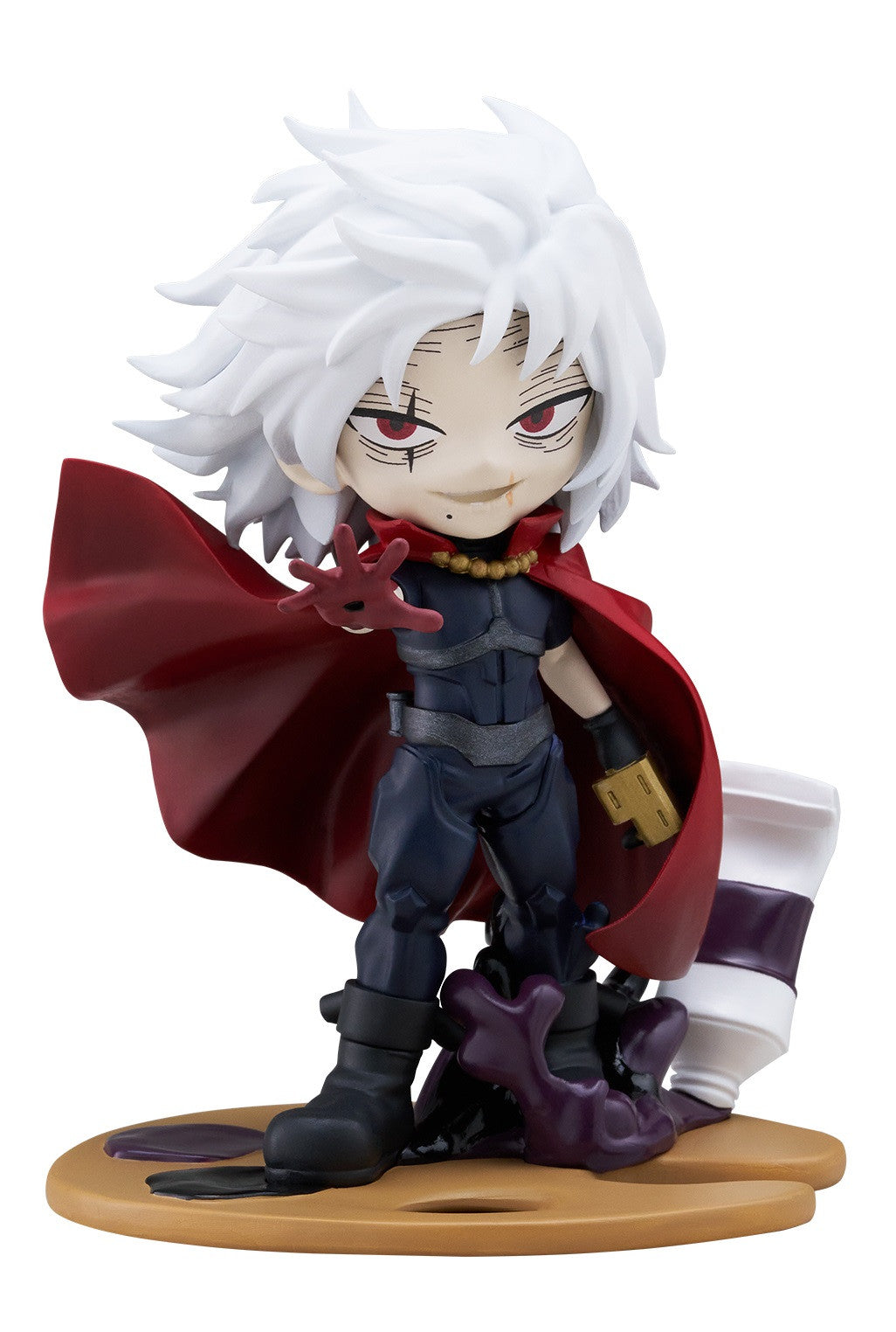 Chibi figure with white spiky hair, red eyes, dark suit, and red cape, hand extended on a paint palette base