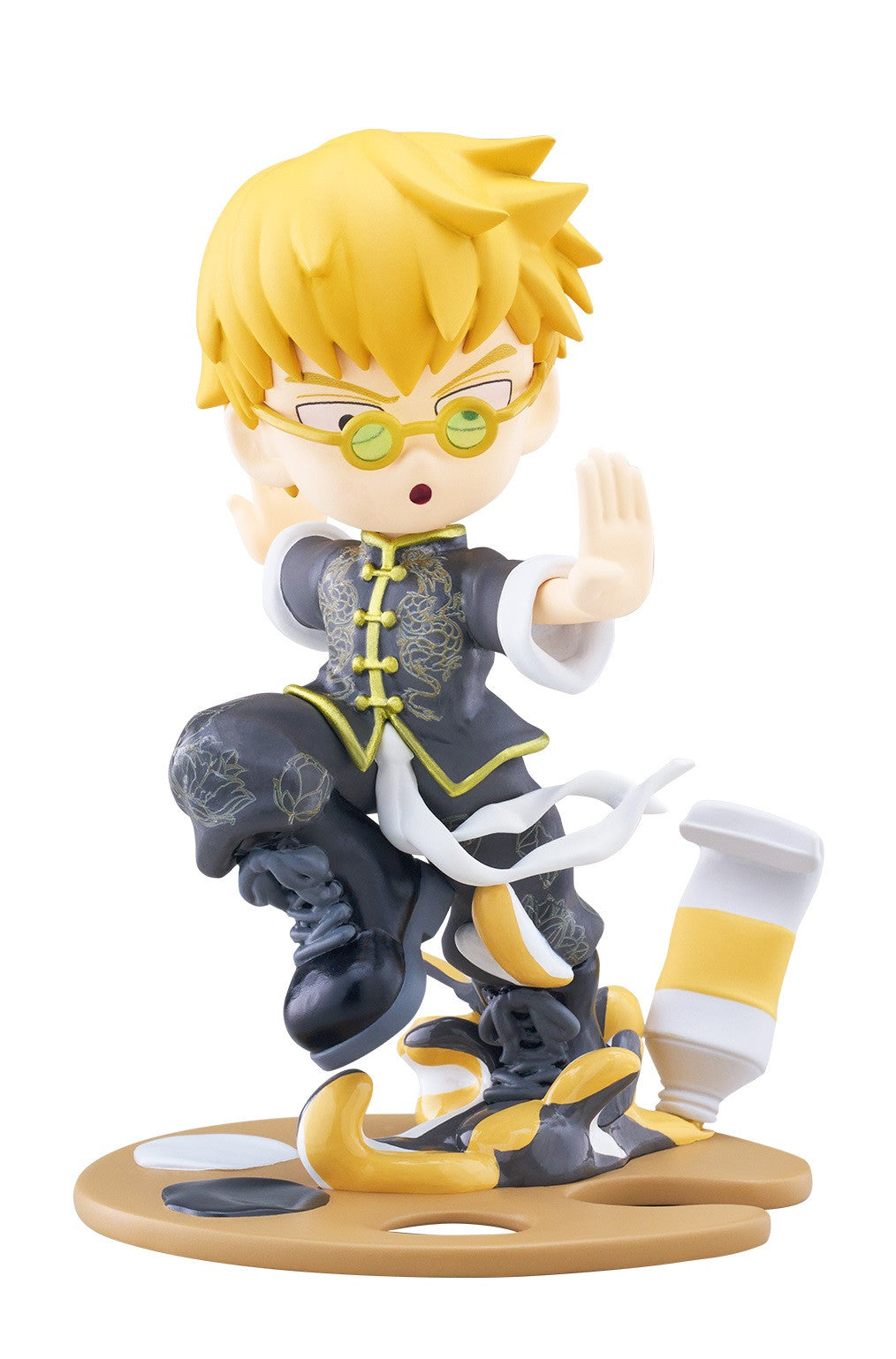 Figure of character with blonde hair and green glasses in black and gold martial arts uniform striking a pose
