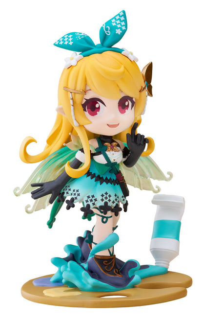 Colorful anime-style figure of a blonde character with wings holding up a finger standing on a gold palette with a blue paint tube on white backgrond
