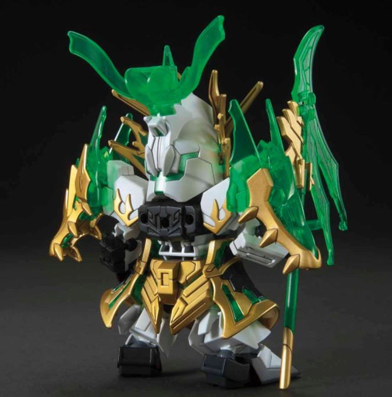 SD mecha figure in white, gold and translucent green armor, featuring dragon detailing and holding a staff