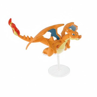 An orange Mega Charizard Y figure with blue wing accents is displayed on a clear stand against a white background