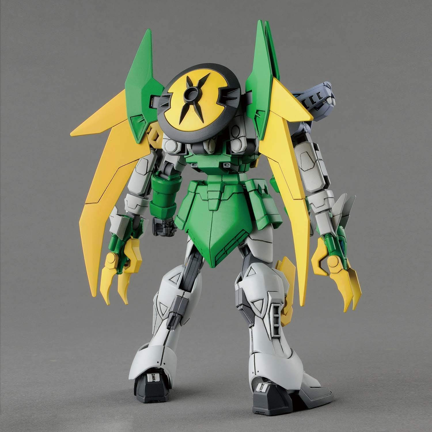 Back view of the green and grey HG 1/144 Gundam Jiyan Altron plastic model highlighting its large yellow backpack and Dragon Fang armaments