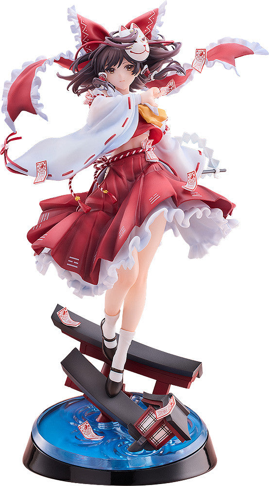 Reimu in dynamic pose with red shrine maiden outfit and spell tag in hand
