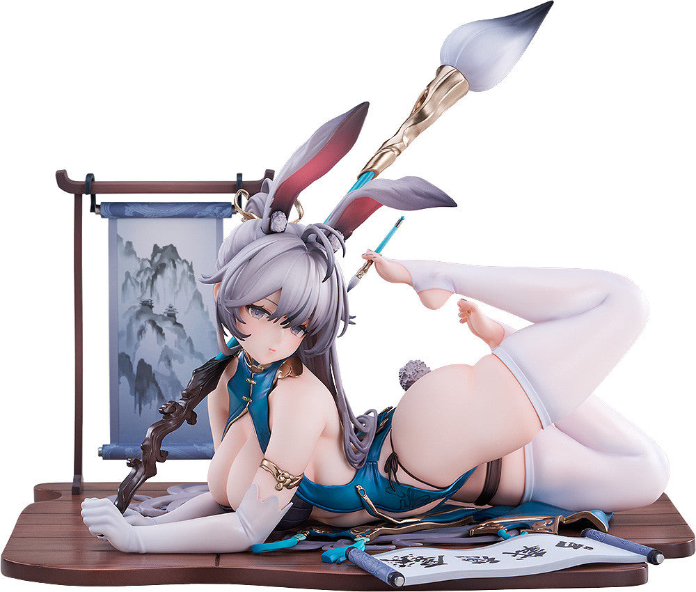 Anime-style figure with long gray hair, bunny ears, teal dress & white thigh-highs, reclining on a wooden base with a large calligraphy brush, small paintbrush, and paper scrolls