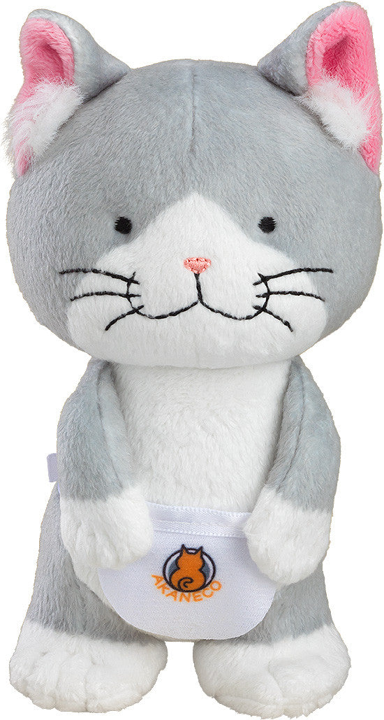 A grey and white cat plush toy with pink ears and a white bib displaying an orange cat logo