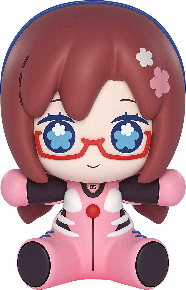 A chibi Mari Makinami figure from Evangelion sits, wearing a pink plugsuit, red glasses, and brown hair with flower clips