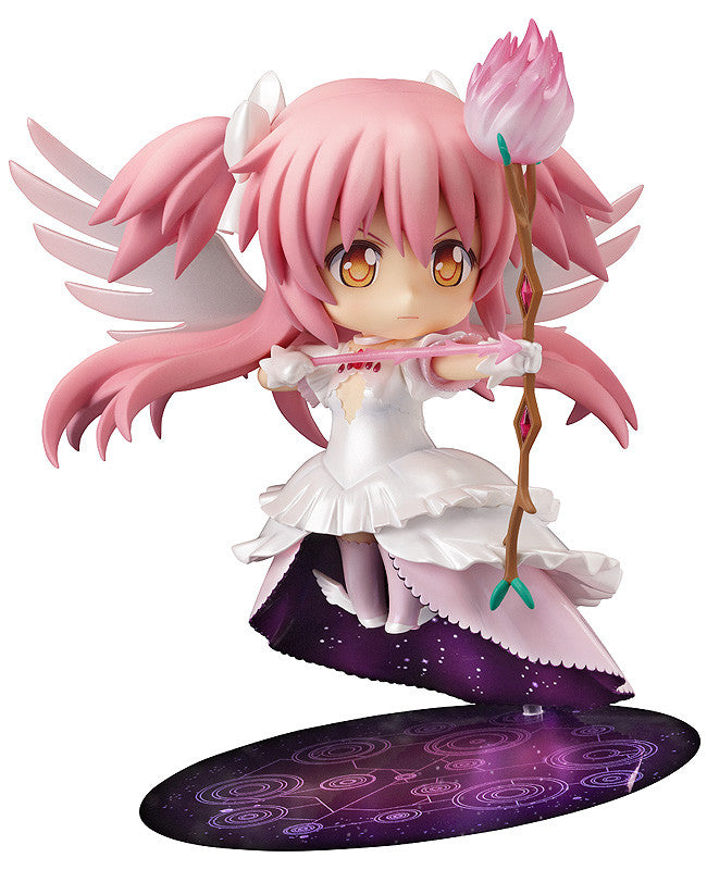 Chibi anime figure with pink pigtails, white wings, and a white dress, drawing a star-tipped bow on a cosmic base