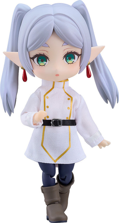 Nendoroid Doll Frieren figure from Frieren Beyond Journey's End wearing a white tunic with gold trim dark pants and brown boots