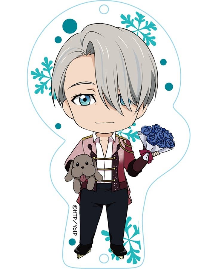 Chibi figure in a skating uniform, holding a plush dog and a bouquet of blue roses