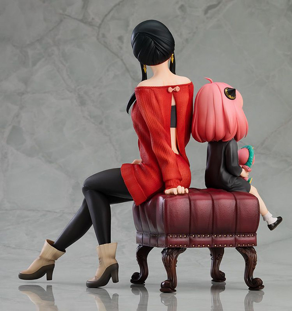 Yor and Anya Forger 17 scale figure in casual outfits sitting on an ottoman rear view