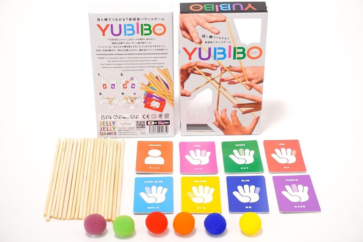 Yubibo balance game set with 2-8 players 5-10 minute play time for ages 6 Includes box wooden sticks six colored soft balls and various hand cards