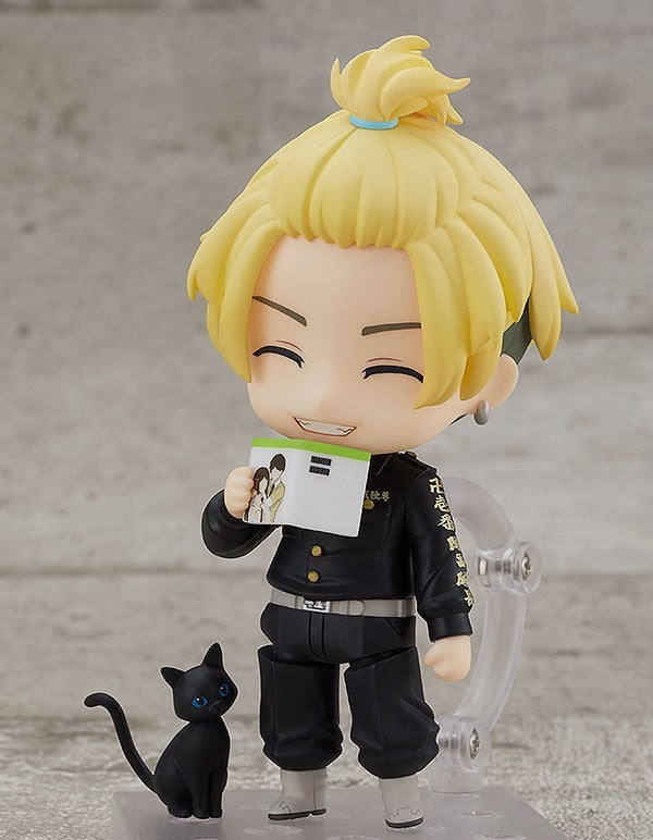 Nendoroid of Tokyo Revengers&#39; Chifuyu Matsuno in his Toman gang uniform holding a photo
