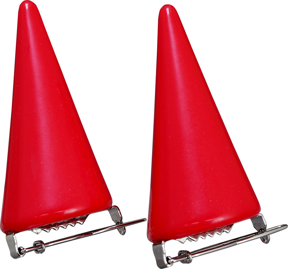 Pair of red pointed hair accessories resembling devil horns or traffic cones attached to silver barrette clips for securing in hair