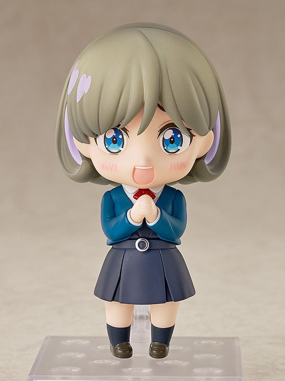 Love Live Superstar Keke Tang Nendoroid action figure with gray hair blue eyes and a school uniform featuring a blue blazer navy pleated skirt and red bow tie