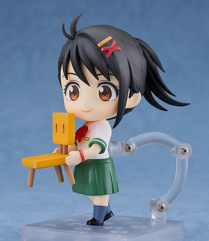 Suzume Iwato Nendoroid figure in school uniform holding a yellow chair