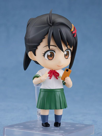 Nendoroid Suzume Iwato figure wearing a green school uniform and holding a phone