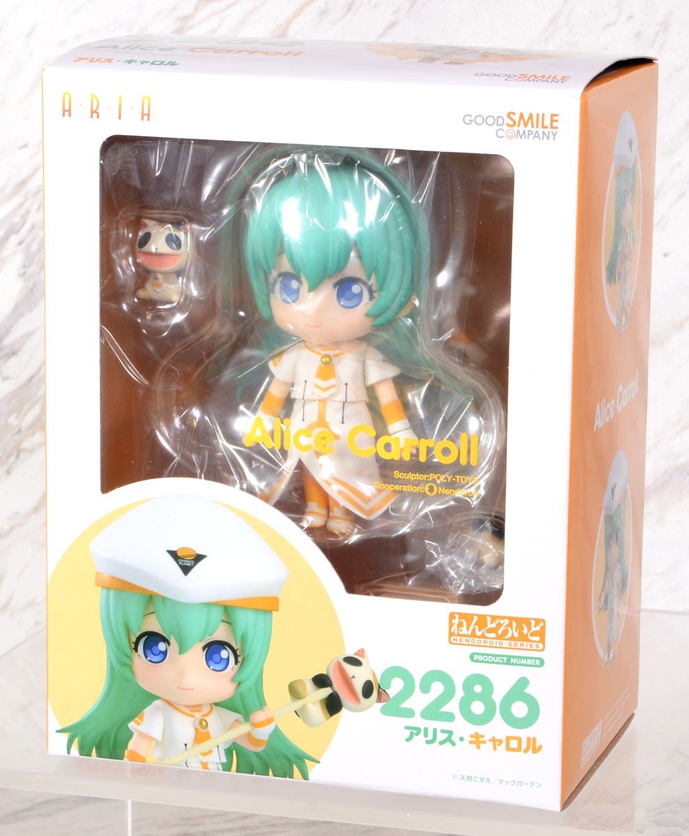 ARIA Nendoroid Alice Carroll figure with green hair in white and orange uniform holding cat puppet on stick