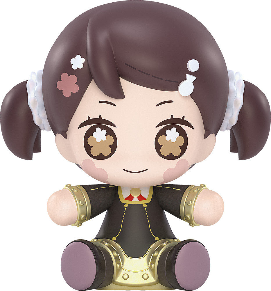 Figure of a girl with brown hair in pigtails wearing a black and gold uniform