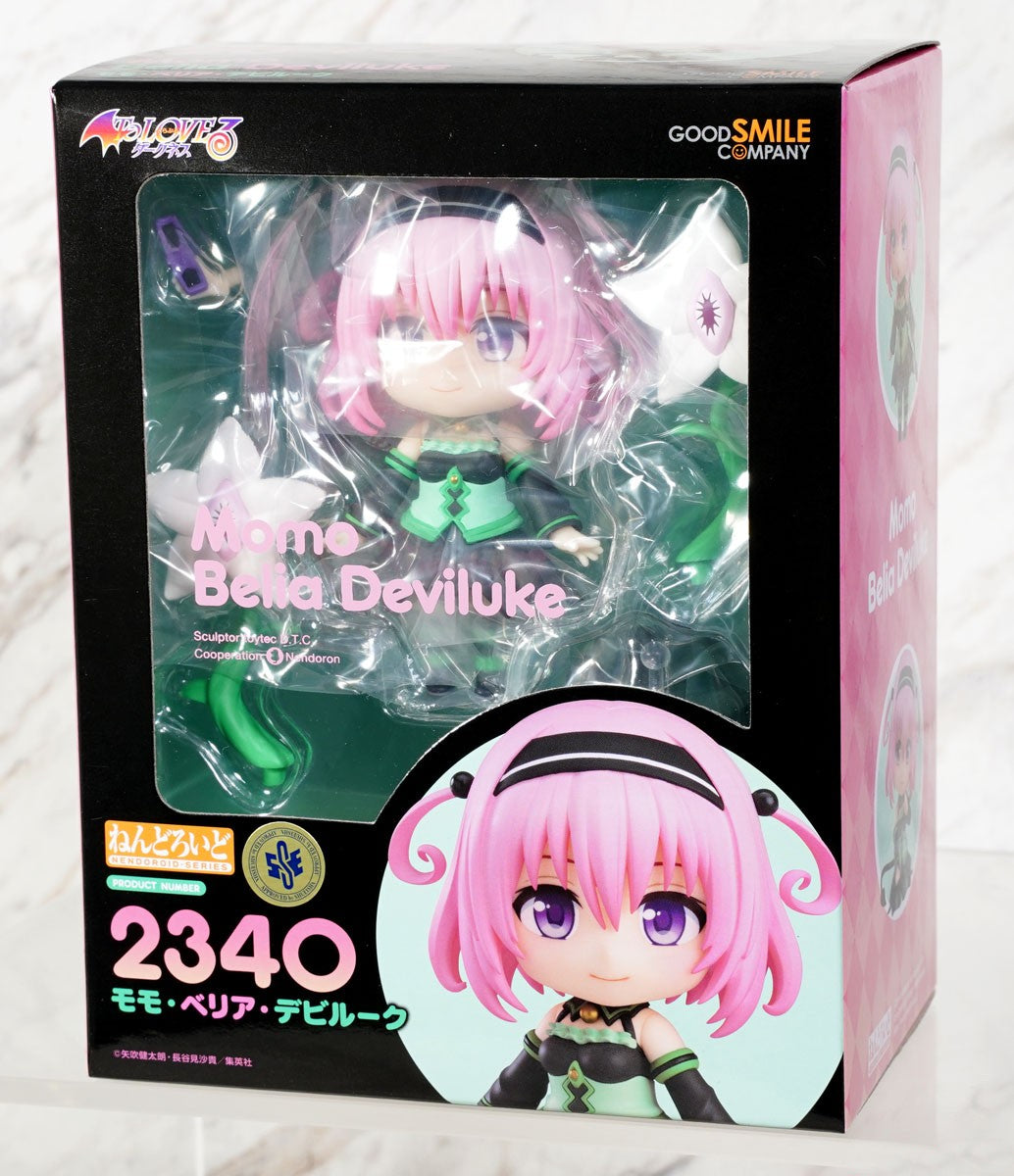 To Love Ru Darkness Nendoroid Momo Belia Deviluke figure in box showing character with pink hair and green and black outfit