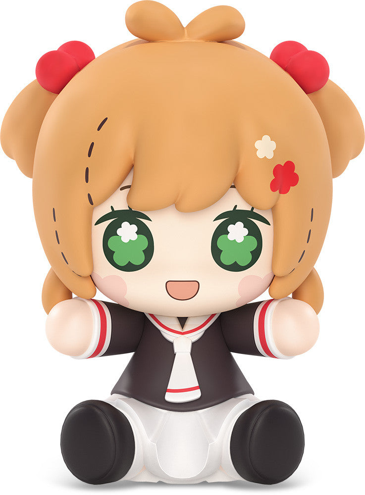 Chibi style doll of Sakura Kinomoto from Cardcaptor Sakura with big green eyes and brown hair