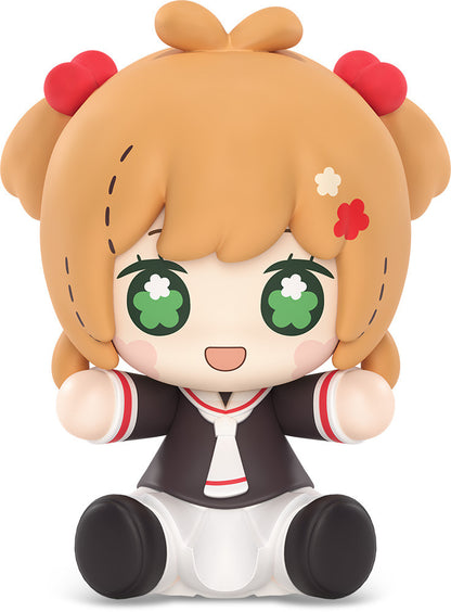 Chibi style doll of Sakura Kinomoto from Cardcaptor Sakura with big green eyes and brown hair