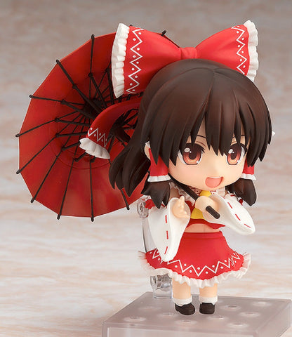 Touhou Project Nendoroid Reimu Hakurei 20 figure standing in red and white shrine maiden outfit with accessories