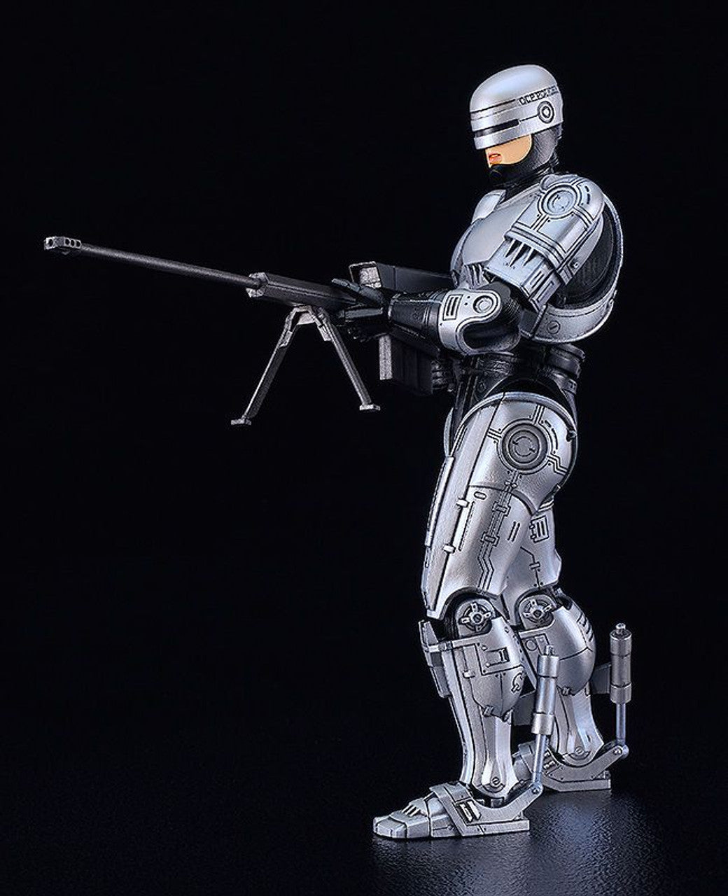MODEROID Robocop 3 action figure in silver and black armor holding a large black rifle with a bipod