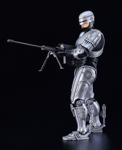 MODEROID Robocop 3 action figure in silver and black armor holding a large black rifle with a bipod