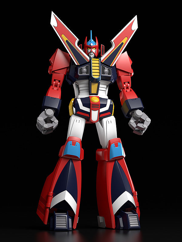 Large red blue and white robot action figure with large pointed wings on its back