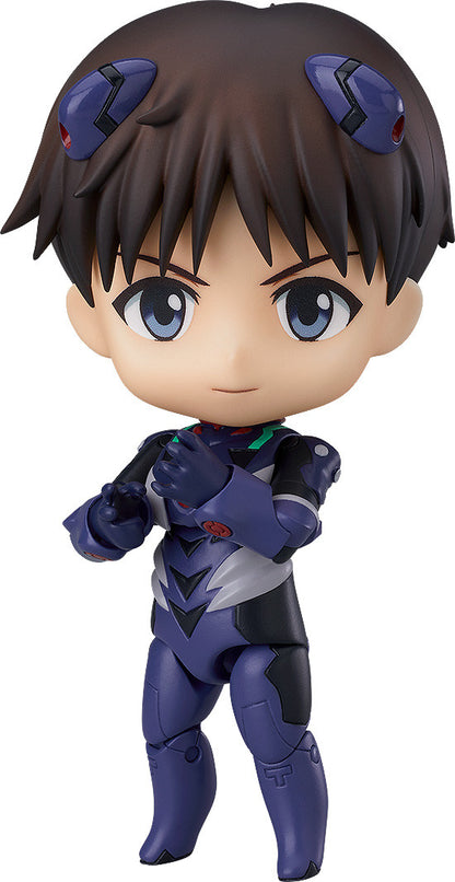 Shinji in plugsuit standing calmly with hands at sides