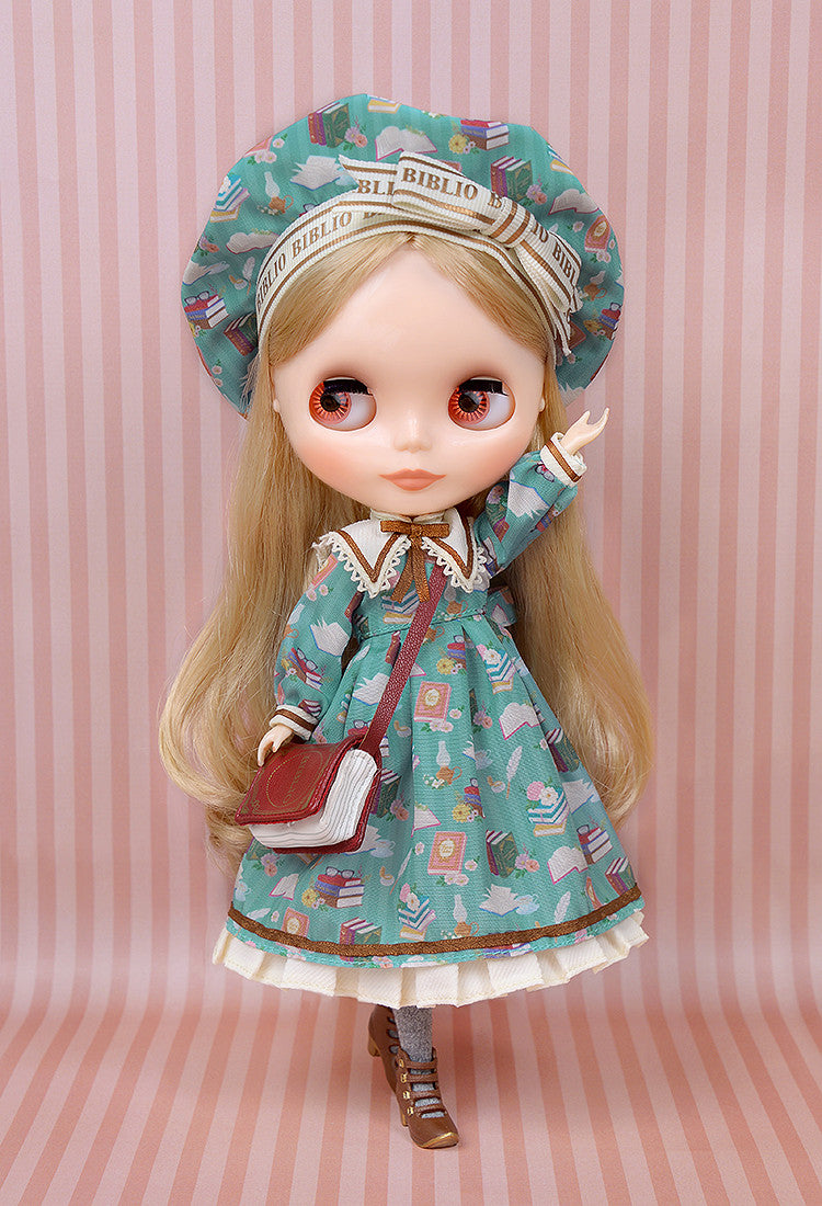 Good Smile Company Blythe Kendra the Bibliophile figure standing, wearing a book-patterned dress, beret, and book bag