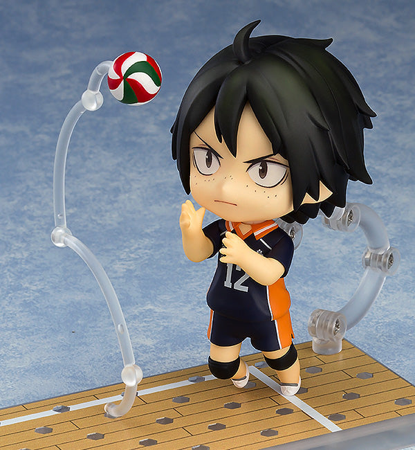 Nendoroid Tadashi Yamaguchi figure holding a volleyball with a cheerful smile