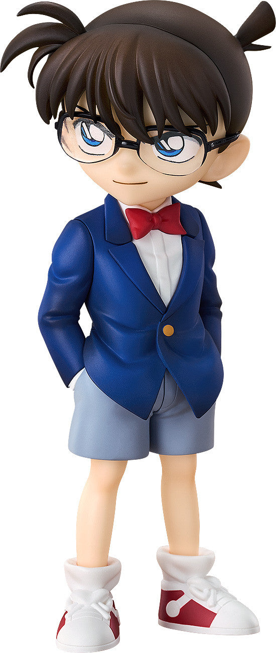 Conan Edogawa figure in a blue blazer red bow tie and gray shorts with white and red sneakers
