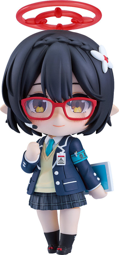Nendoroid of a black-haired girl with red glasses, pointy ears, red halo, school uniform, holding a book