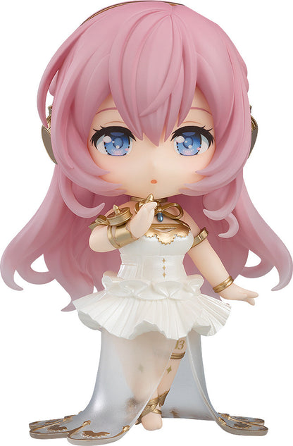 Nendoroid figure with long pink hair, blue eyes, and a white & gold dress, holding a finger to her lips